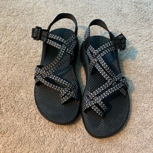 Black and white toe cross Chaco sandals
